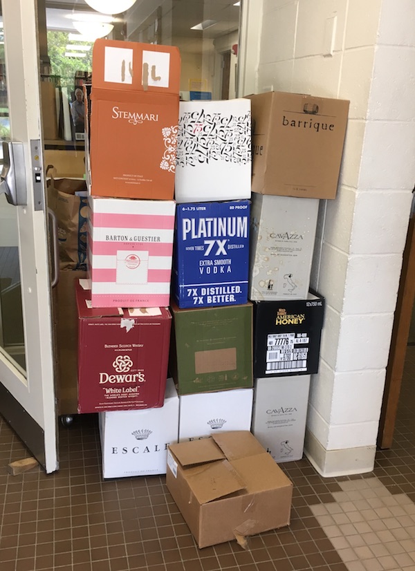 13 liquor boxes full of books